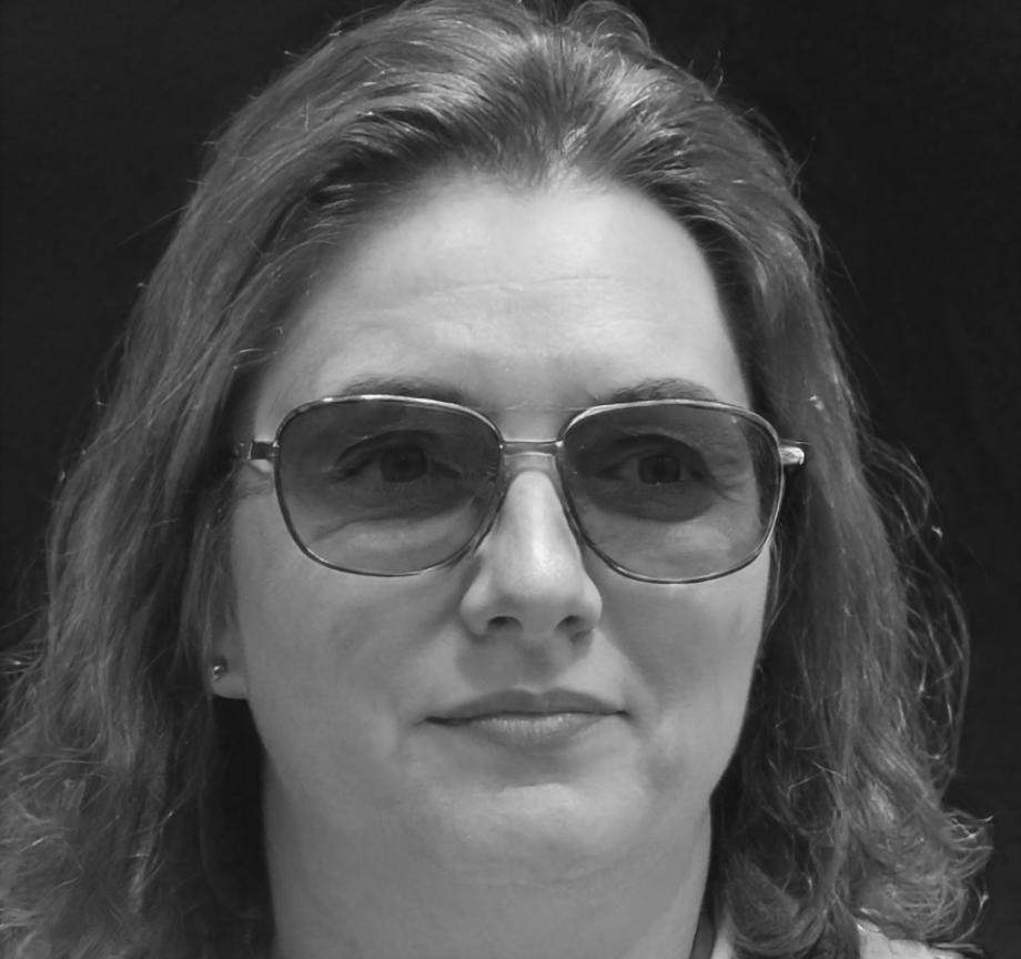 Program advisor Sarah Chen discussing learning paths with prospective students